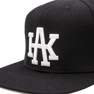 Protect Your Turf AK Monogram Black Snapback Hat